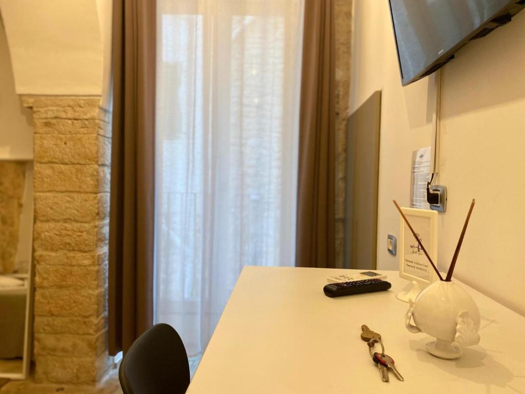 TV a/nebo společenská místnost v ubytování Altrelli Rooms