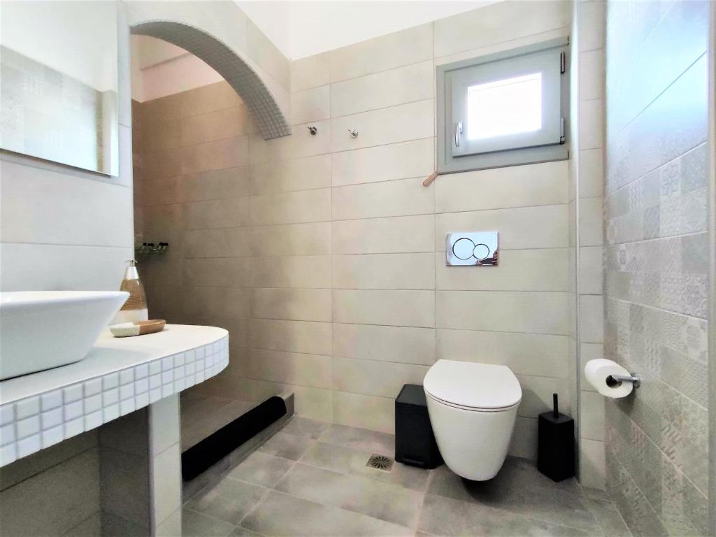 Koupelna v ubytování Studio Elpida Santorini