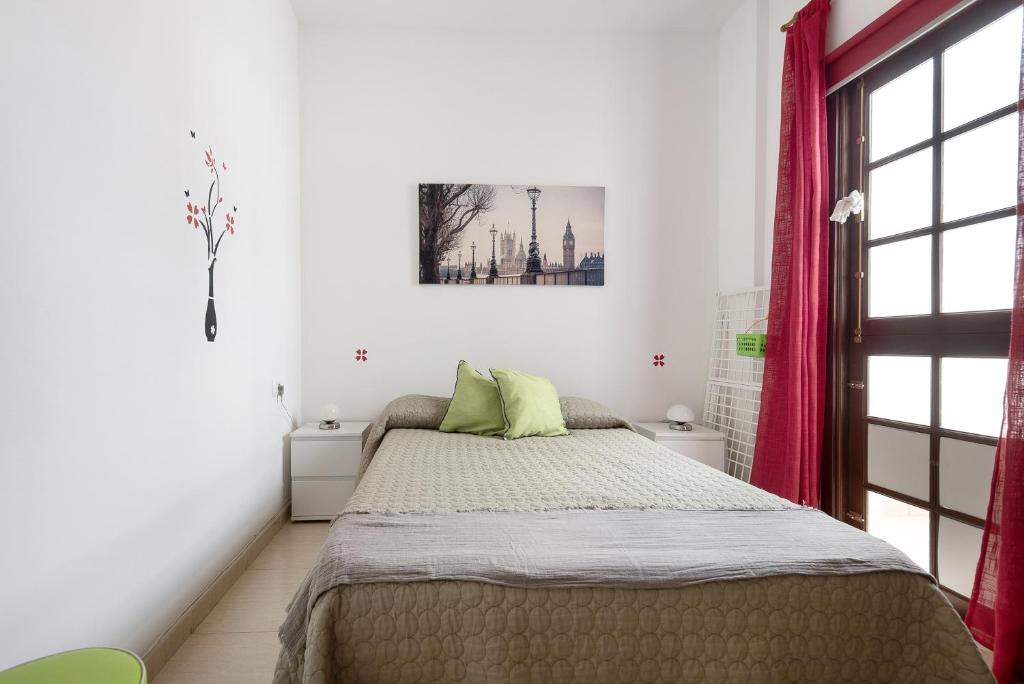 Posteľ alebo postele v izbe v ubytovaní Apartamento Elena