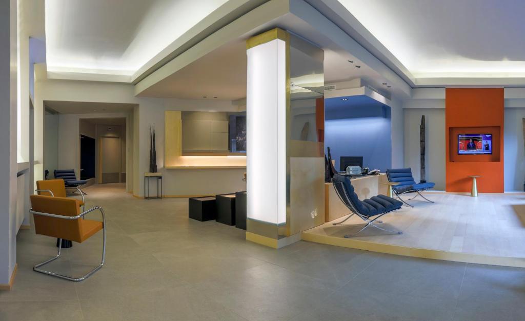 TV a/nebo společenská místnost v ubytování Hotel Velino