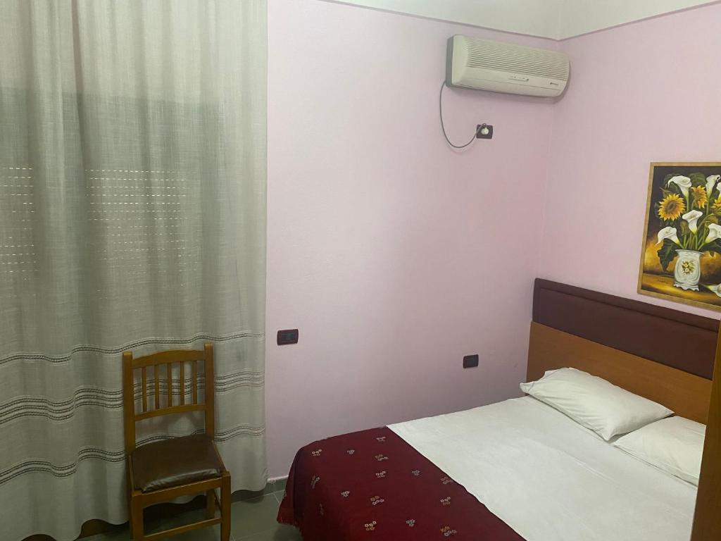 Postel nebo postele na pokoji v ubytování Hotel Edland