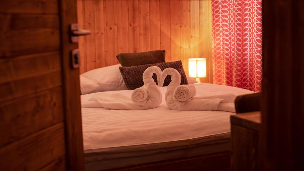 Postel nebo postele na pokoji v ubytování Vila Somani