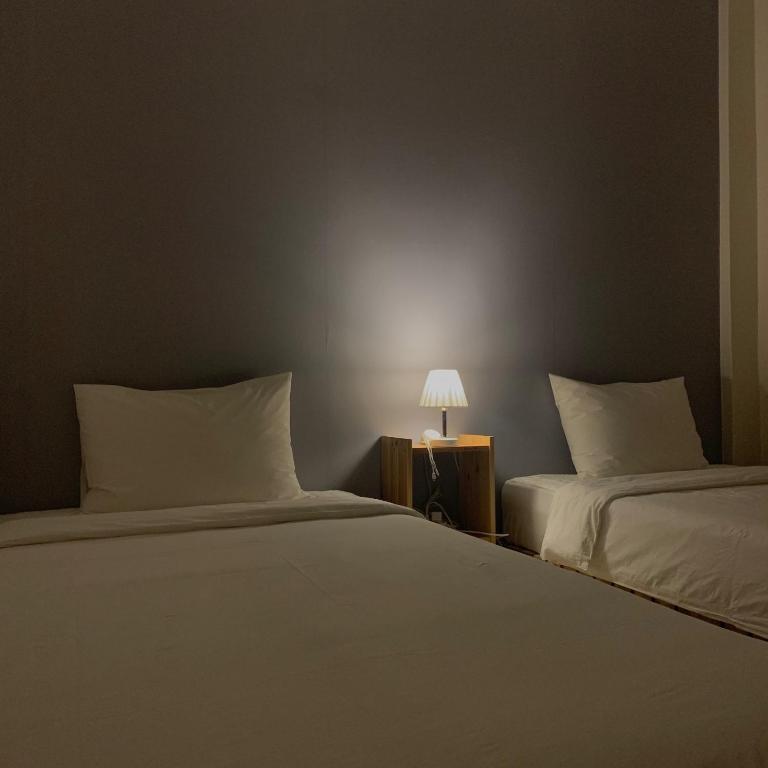 Postel nebo postele na pokoji v ubytování Hostel Espace