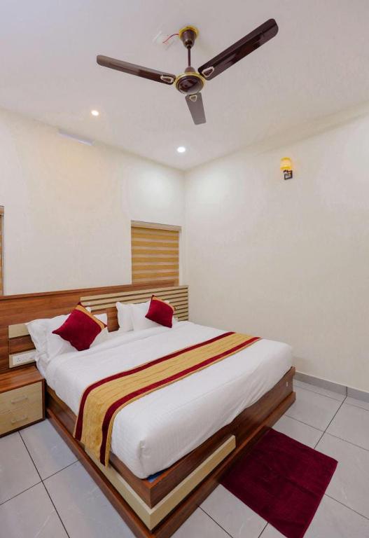 Postel nebo postele na pokoji v ubytování Greenfield Homestay