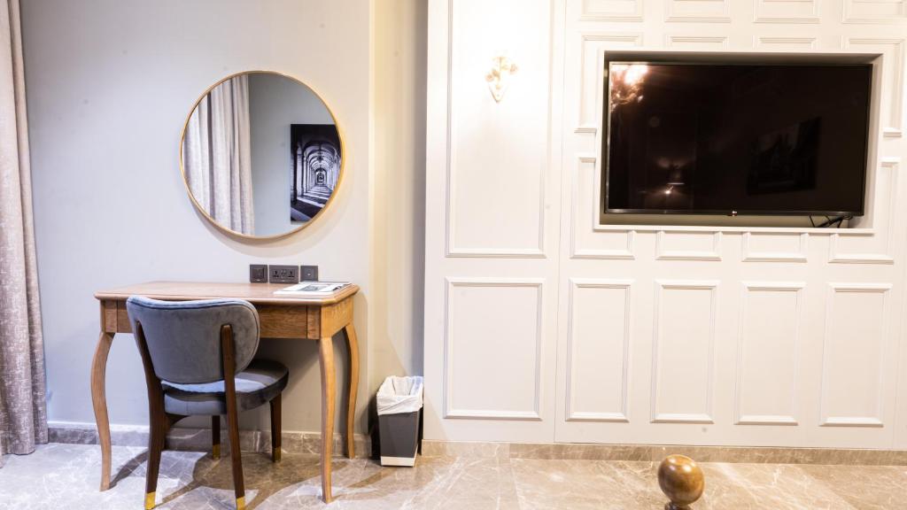 TV a/nebo společenská místnost v ubytování President Hotel