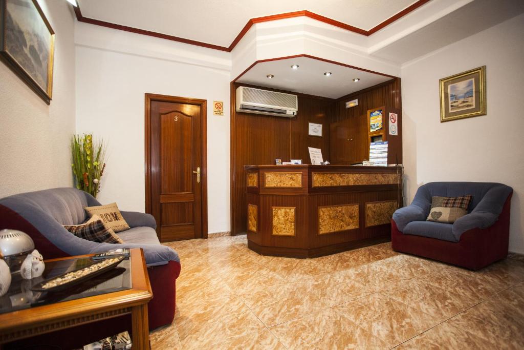 Lobbyn eller receptionsområdet på Pensión Carrera