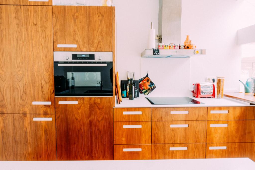 Kuchyň nebo kuchyňský kout v ubytování Huis aan de Haven