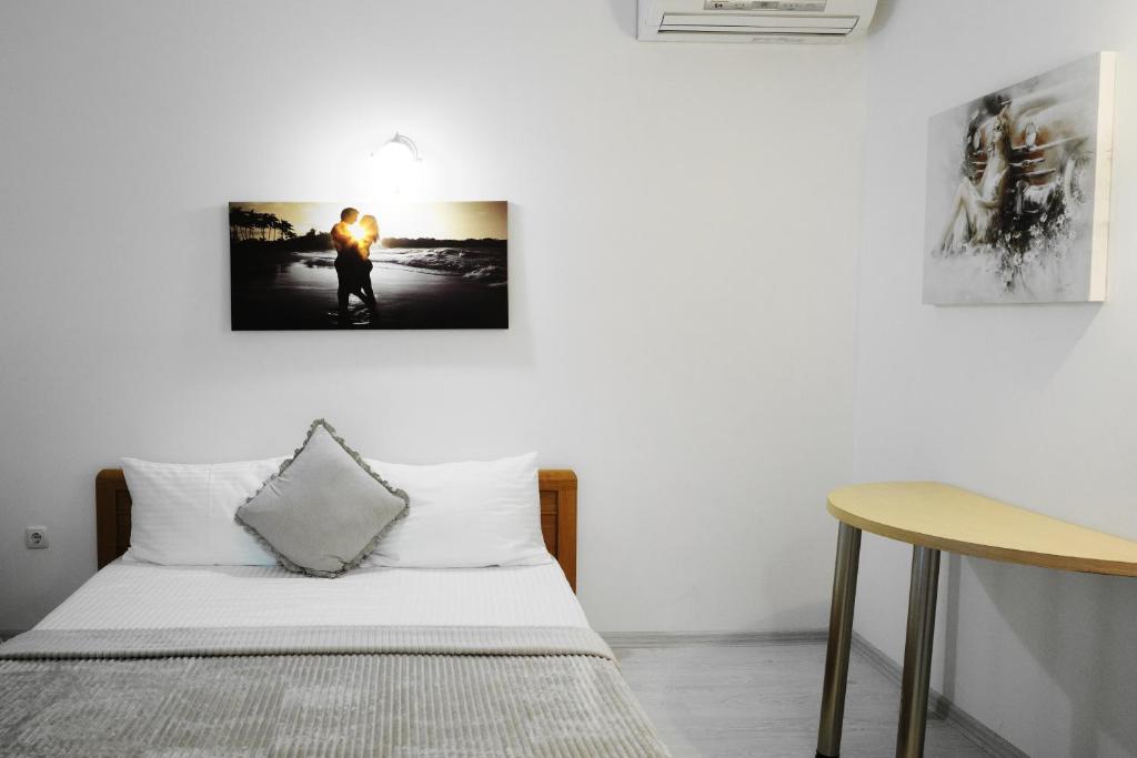 Postel nebo postele na pokoji v ubytování DONE KANDYBONE Apartments