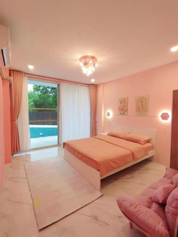 Postel nebo postele na pokoji v ubytování QH民宿