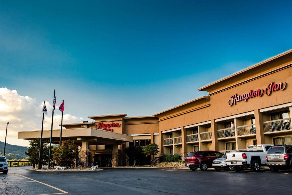 a hotel with cars parked in front of it at Hampton Inn Caryville-I-75/Cove Lake-State Park in Caryville