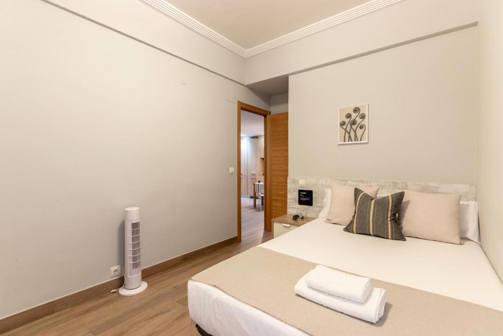 Postel nebo postele na pokoji v ubytování KAROLA amplio apartamento junto a San Mamés