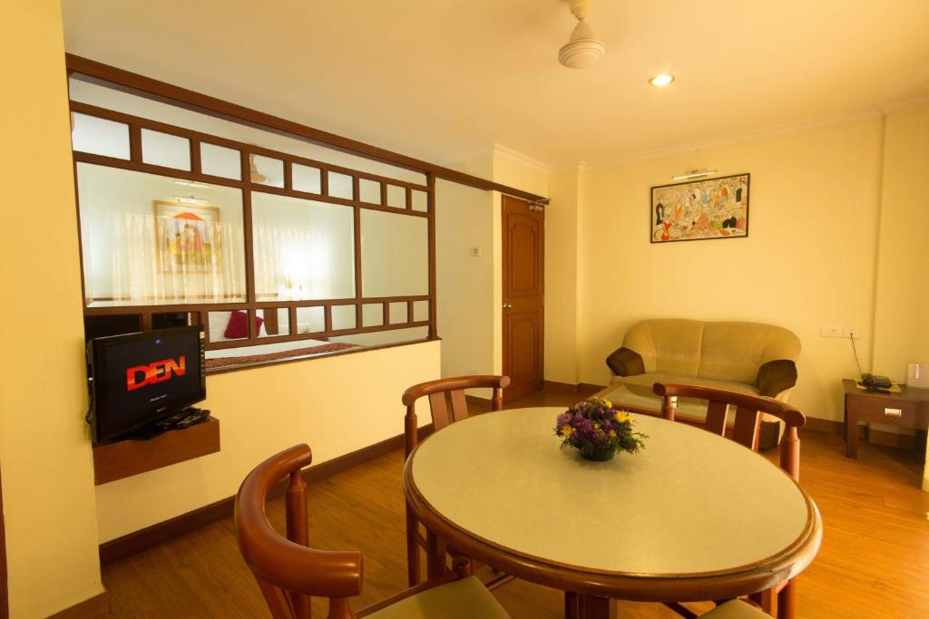 Posezení v ubytování Hotel Aiswarya