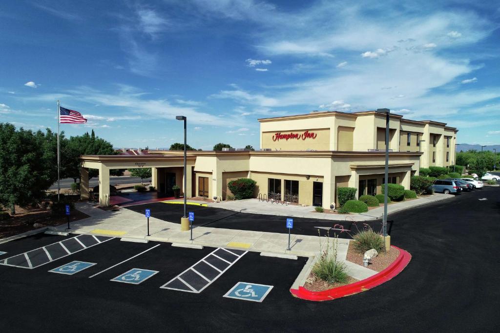 a building with a parking lot in front of it at Hampton Inn Sierra Vista in Sierra Vista