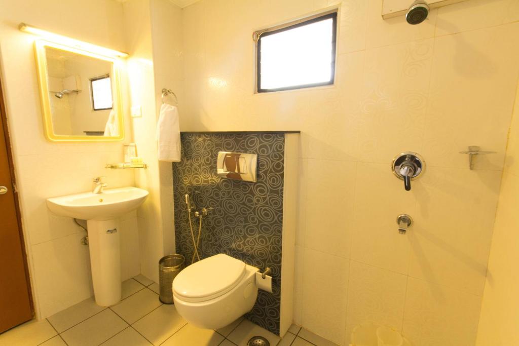 Koupelna v ubytování Hotel Aiswarya