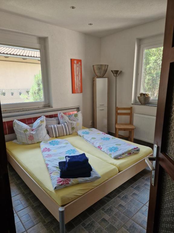 Posteľ alebo postele v izbe v ubytovaní Uwes Apartment