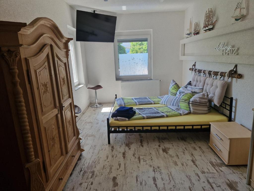 Televízia a/alebo spoločenská miestnosť v ubytovaní Uwes Apartment