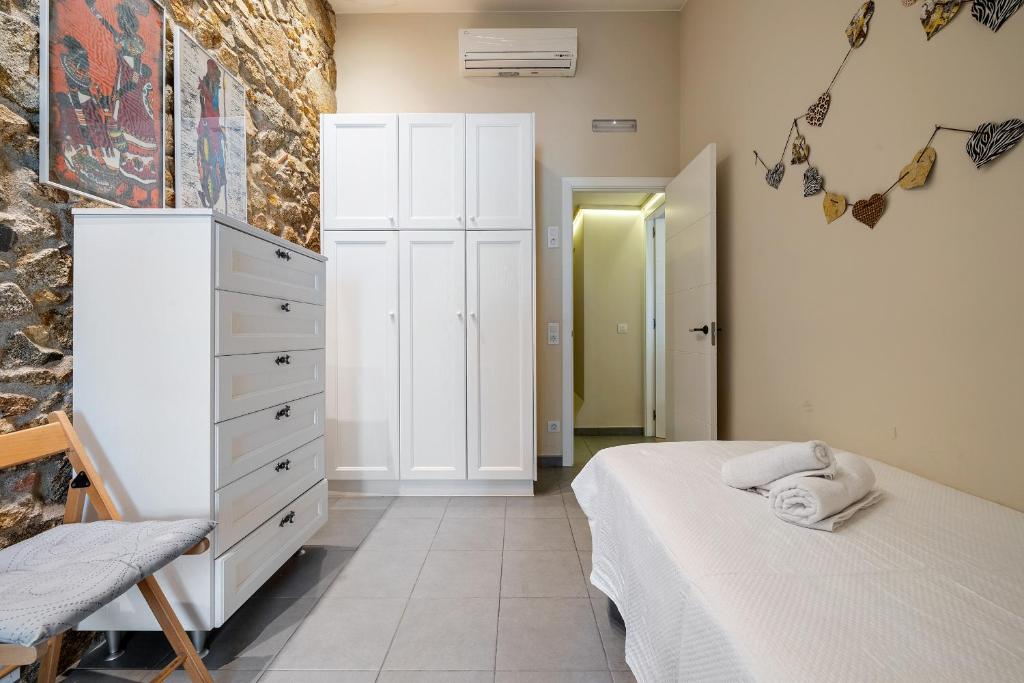 Posteľ alebo postele v izbe v ubytovaní Hauzify I Casa Palou