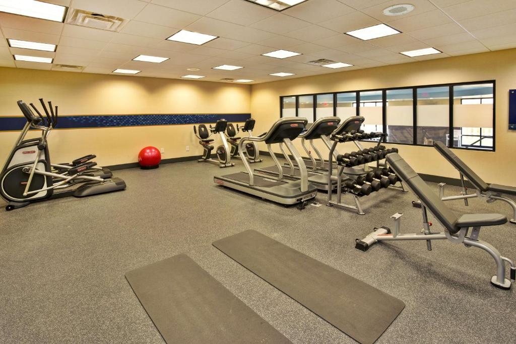 a gym with several treadmills and cardio machines at Hampton Inn Niagara Falls/ Blvd in Niagara Falls