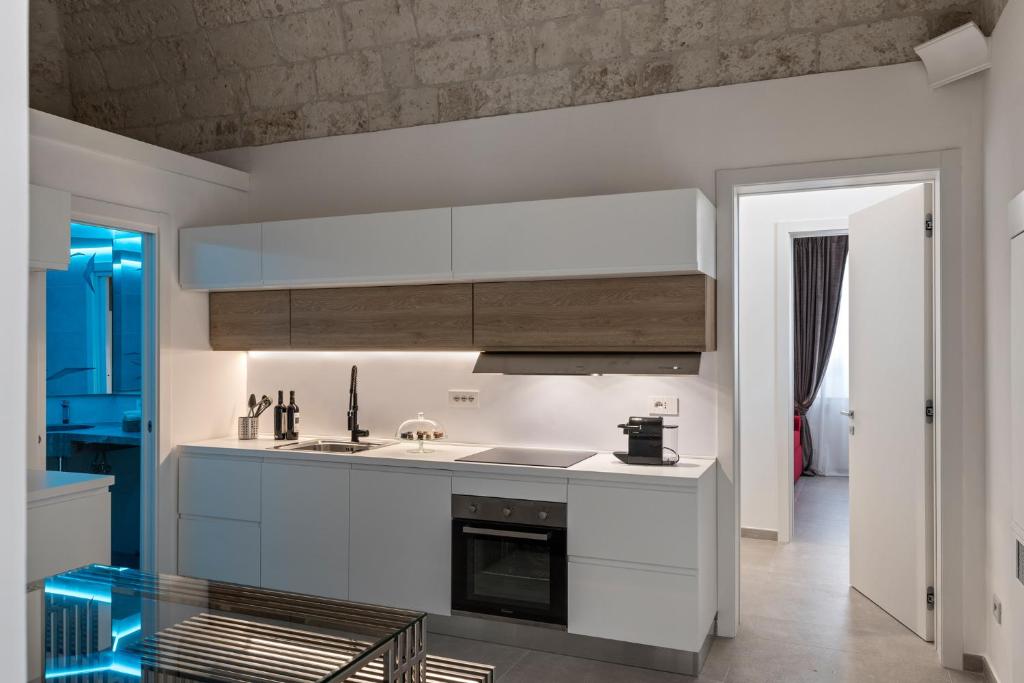 A kitchen or kitchenette at Casa Massima Suites & SPA