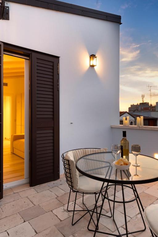 A balcony or terrace at Casa Massima Suites & SPA