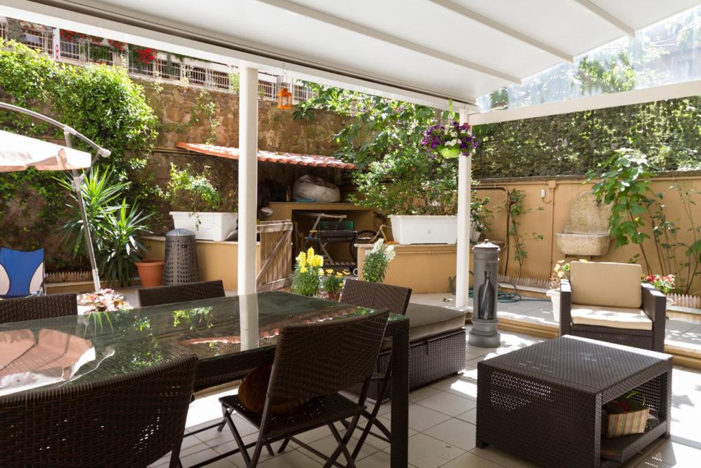 Posezení v ubytování Vacanze Romane con giardino