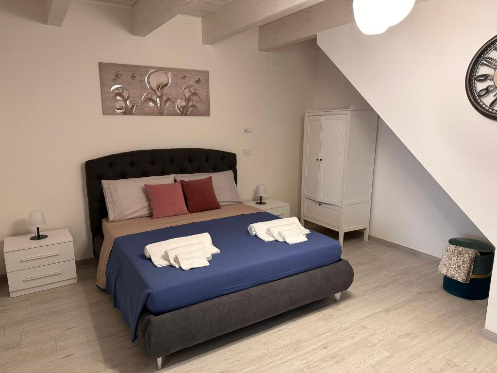 Postel nebo postele na pokoji v ubytování B&B La Fortezza