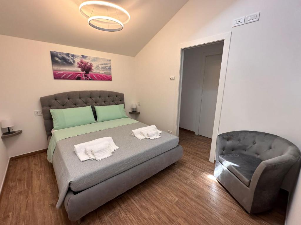 Postel nebo postele na pokoji v ubytování B&B La Fortezza