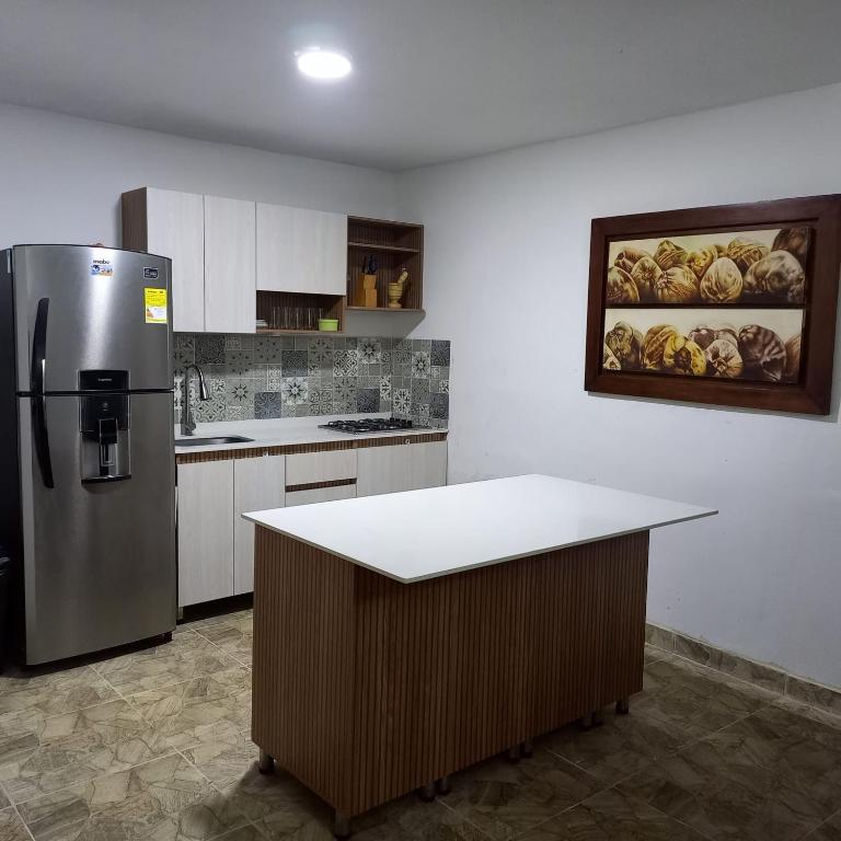 Kuchyň nebo kuchyňský kout v ubytování Cabaña #5 en Condominio Mar de Coveñas