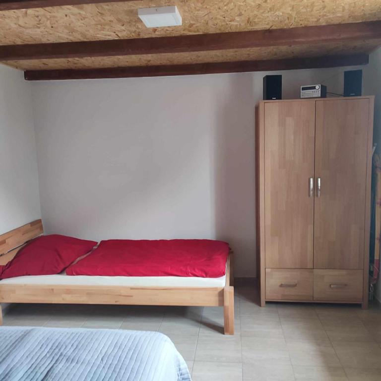 Postel nebo postele na pokoji v ubytování Ubytování U nás na Moravě