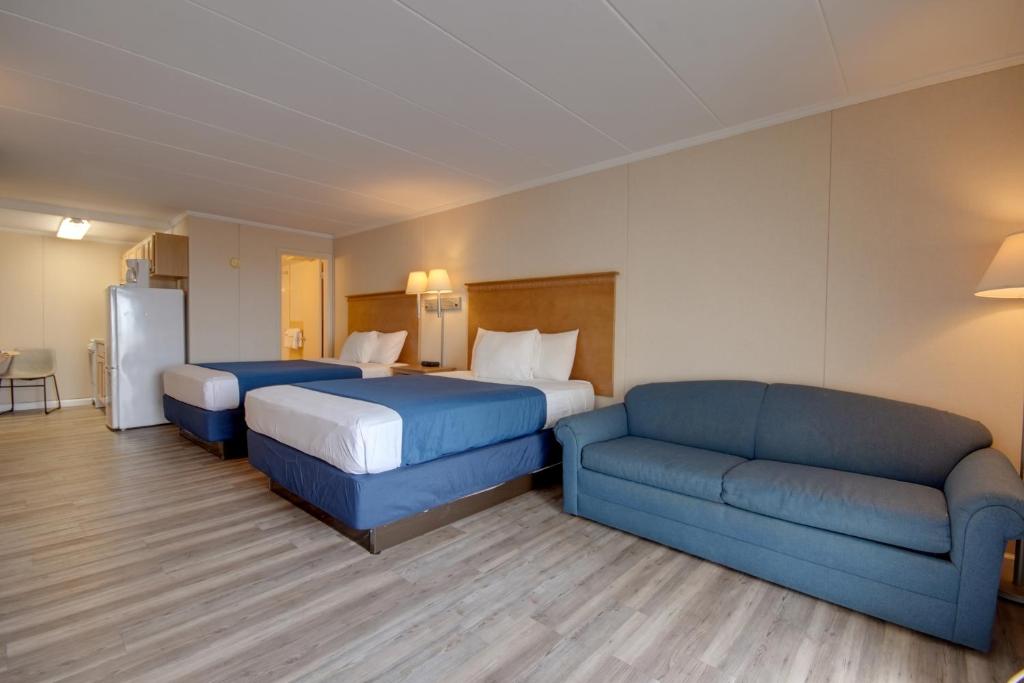 Ένα ή περισσότερα κρεβάτια σε δωμάτιο στο Flamingo Motel