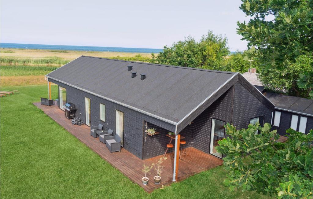 an overhead view of a black house with a deck at Beautiful Home In Slagelse With Wifi in Slagelse