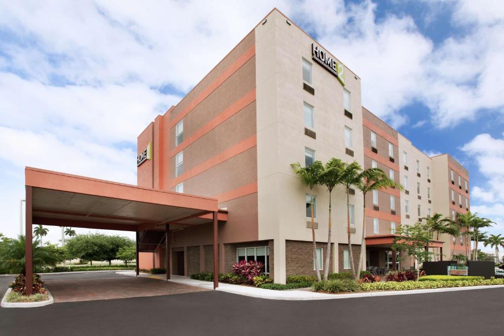 una representación de la parte delantera de un hotel en Home2 Suites by Hilton Florida City, en Florida City