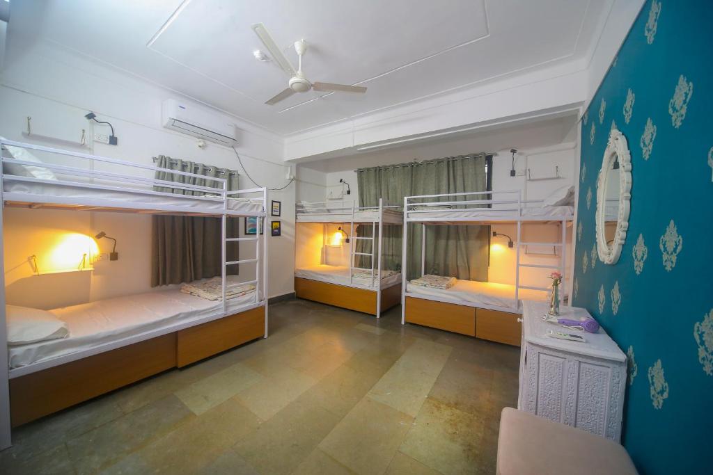 Postel nebo postele na pokoji v ubytování Hostell One - A complete backpacker & Coworking Hub