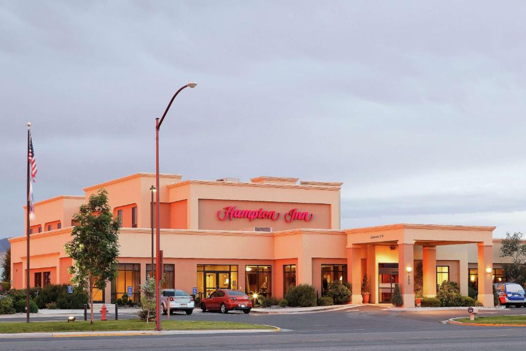 a front view of a building with a shopping center at Hampton Inn Montrose in Montrose