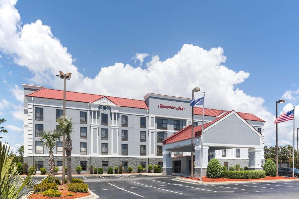 a rendering of a hotel with a parking lot at Hampton Inn Myrtle Beach West in Myrtle Beach