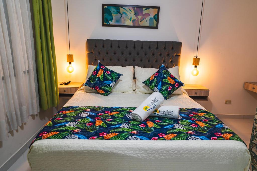 Postel nebo postele na pokoji v ubytování Villeta Resort Hotel
