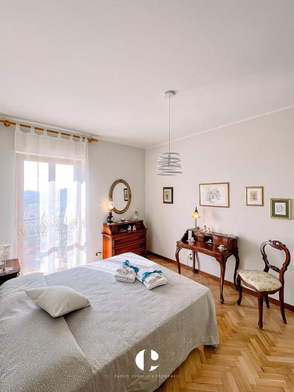 Postel nebo postele na pokoji v ubytování Borgo Antico