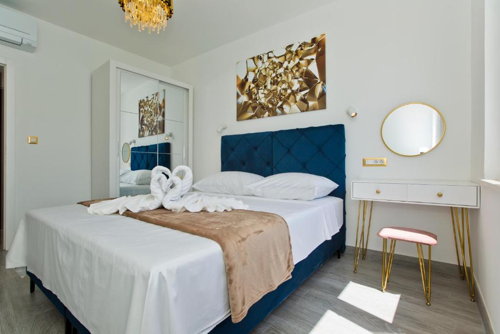 Łóżko lub łóżka w pokoju w obiekcie Luxury Apartment Veronika