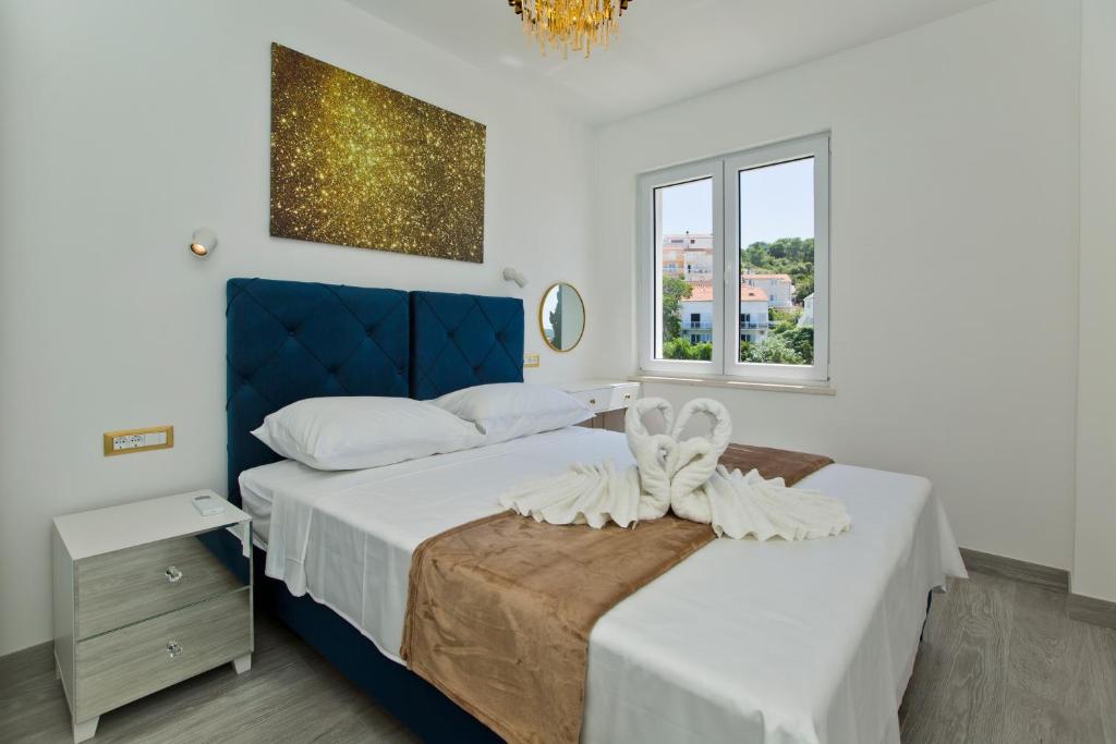 Łóżko lub łóżka w pokoju w obiekcie Luxury Apartment Veronika