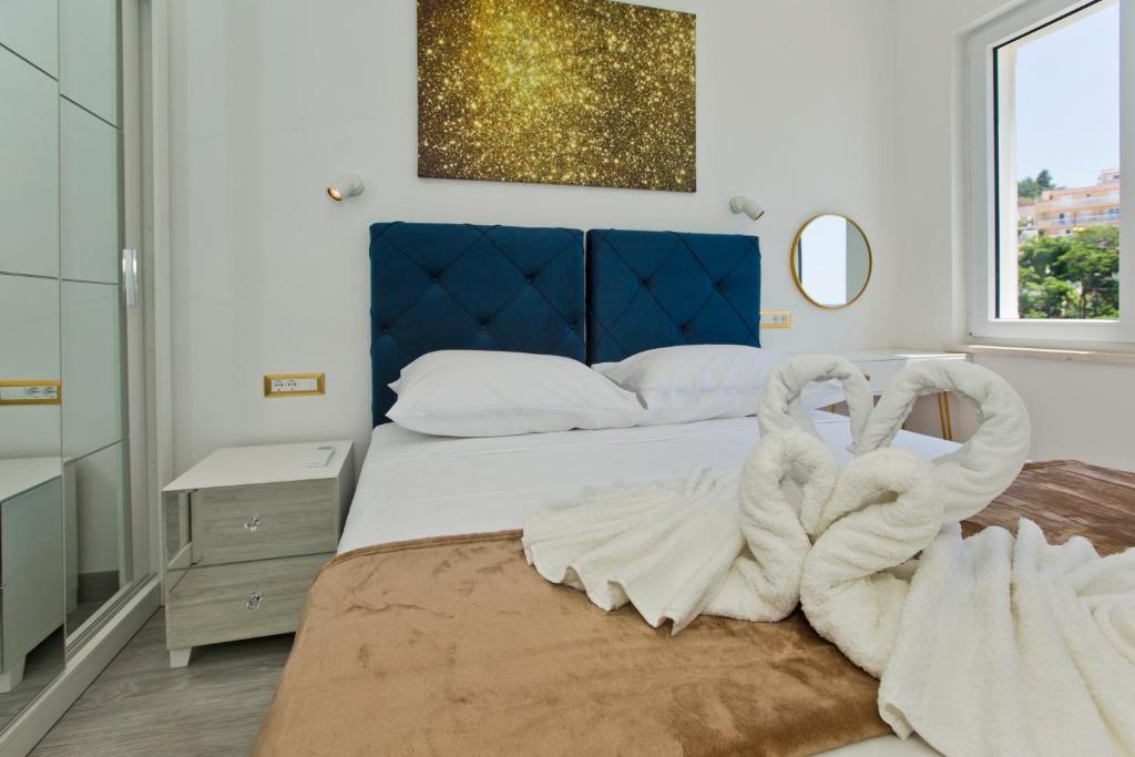 Łóżko lub łóżka w pokoju w obiekcie Luxury Apartment Veronika