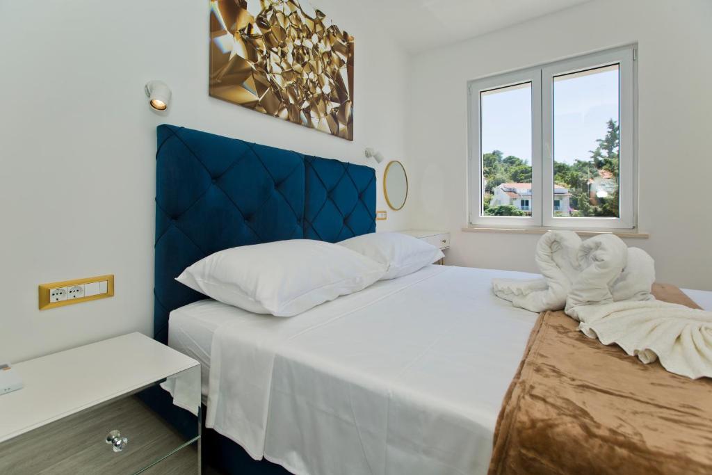 Łóżko lub łóżka w pokoju w obiekcie Luxury Apartment Veronika