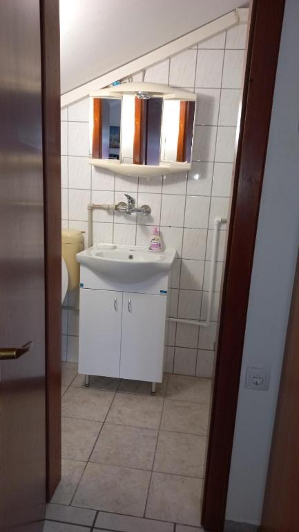 Koupelna v ubytování Apartments Popov