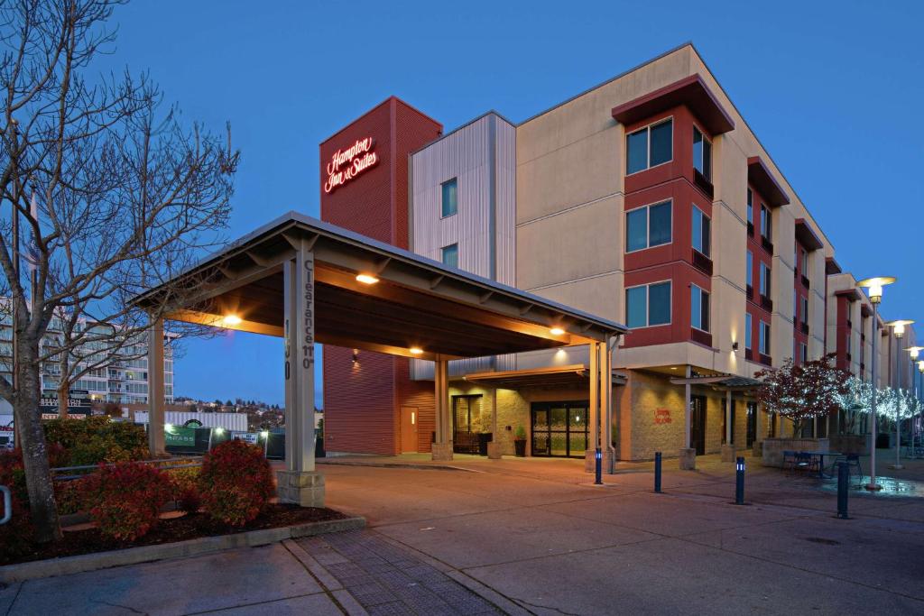 a hotel building with a gazebo in front of it at Hampton Inn & Suites Bremerton in Bremerton