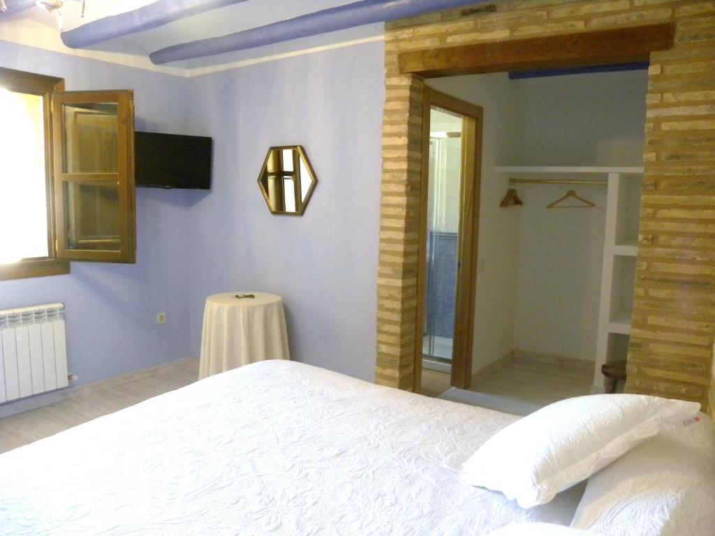 Postel nebo postele na pokoji v ubytování Casa Jabonero