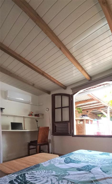 Postel nebo postele na pokoji v ubytování Villa Pomme cannelle