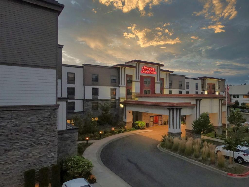 a rendering of a hotel with a driveway at Hampton Inn & Suites DuPont in DuPont
