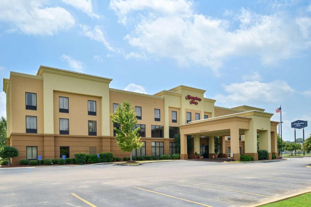 a rendering of the front of a hotel with a parking lot at Hampton Inn Selma in Selma