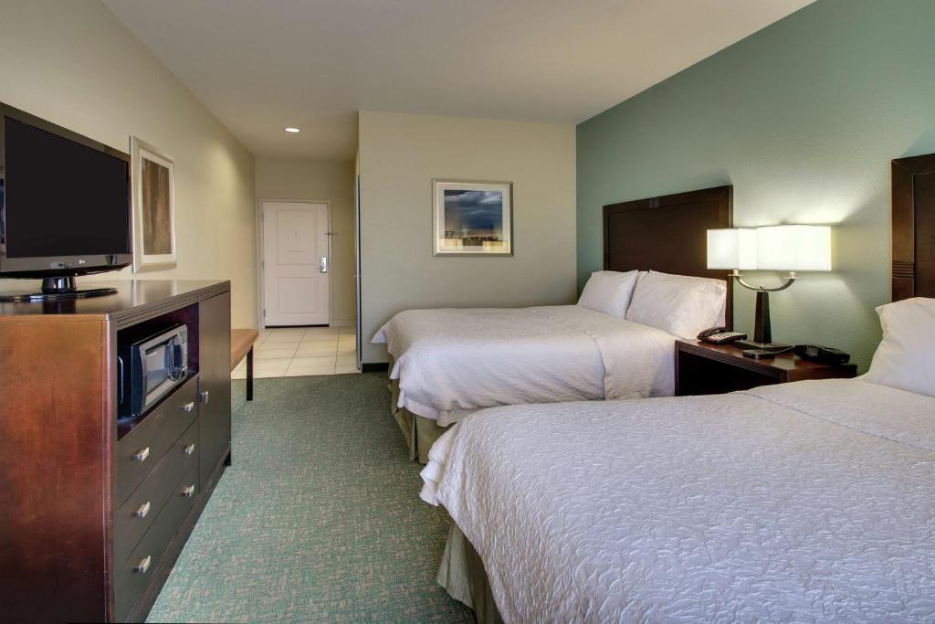 Postel nebo postele na pokoji v ubytování Hampton Inn Vernon
