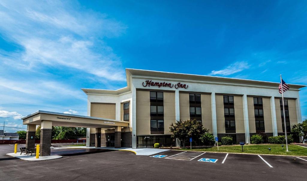 a hotel building with an american sign on it at Hampton Inn St Charles St Peters in St. Charles