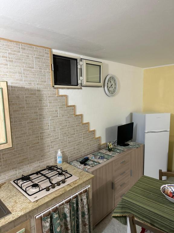 Kuchyň nebo kuchyňský kout v ubytování Carrube House